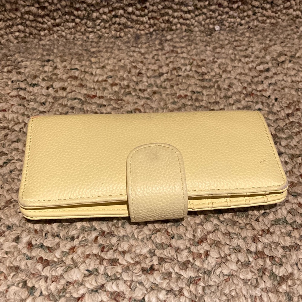 Used wallet with minor stain on front and back